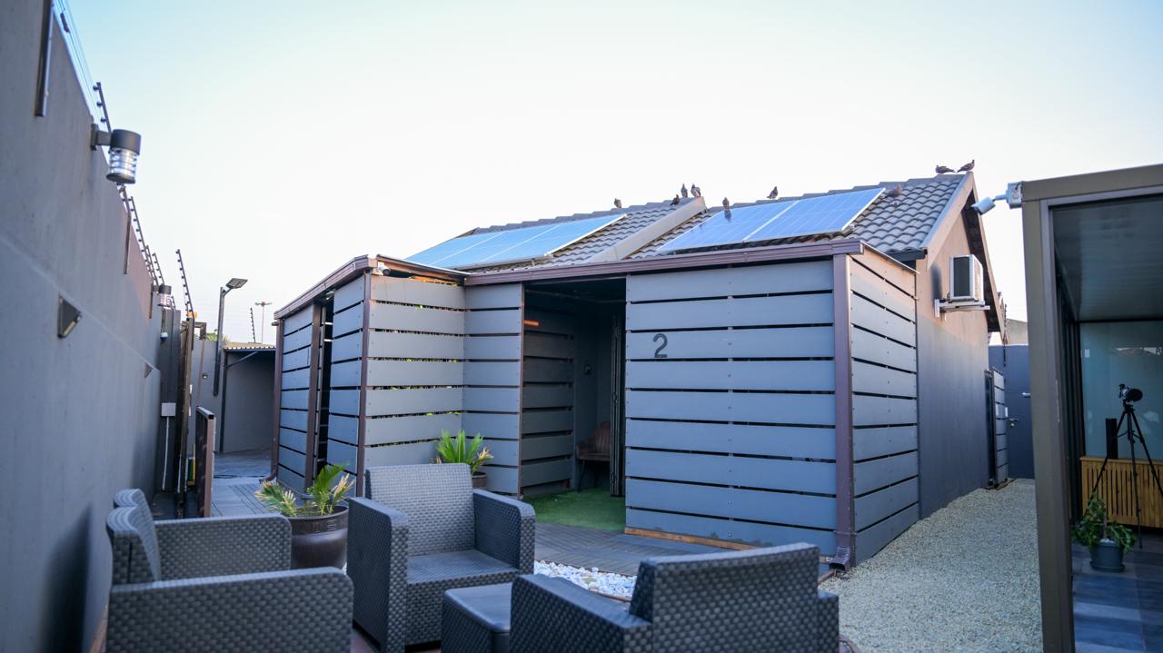 Courtyard seating outside the self-catering units at House Of Nyibiba